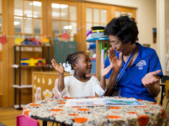 ECE teacher and child