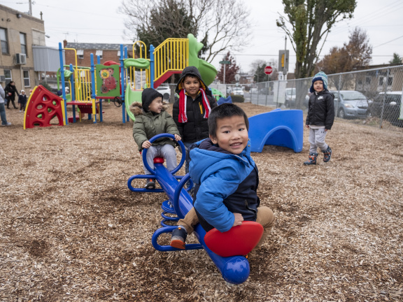 child on seesaw