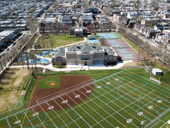 Kingsessing Recreation Center and Library drone arial shot of buildings and field. 