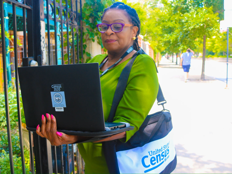 US Census Bureau canvasser with a laptop