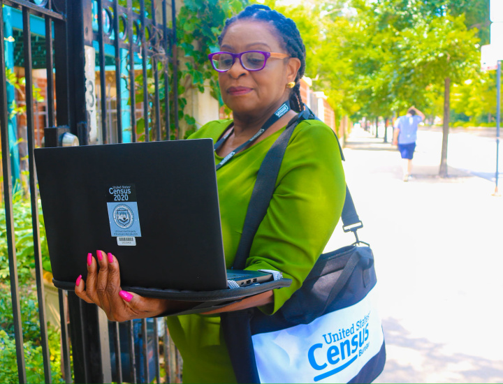 US Census Bureau canvasser with a laptop